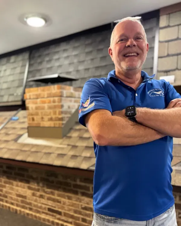 Jeff Penninger in the Masters Roofing showroom.