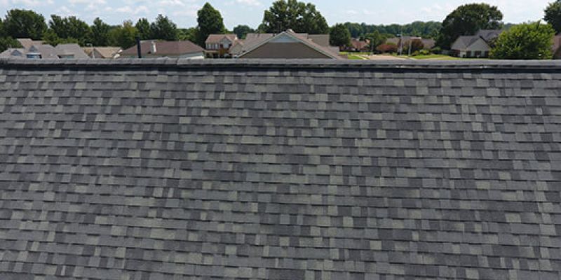 A top view of home showing asphalt shingles.