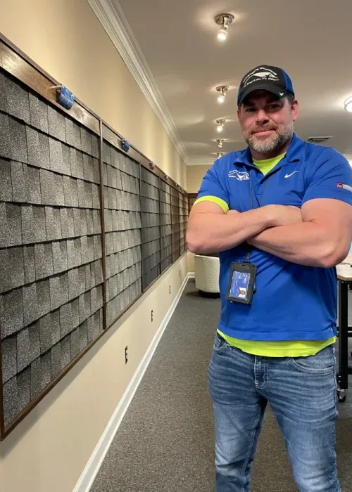 Robert Floyd in the Masters Roofing showroom.