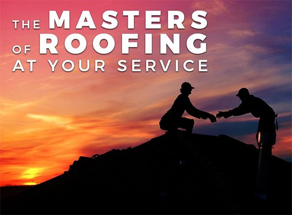 Two-roofers-working-late-on-a-roof-top