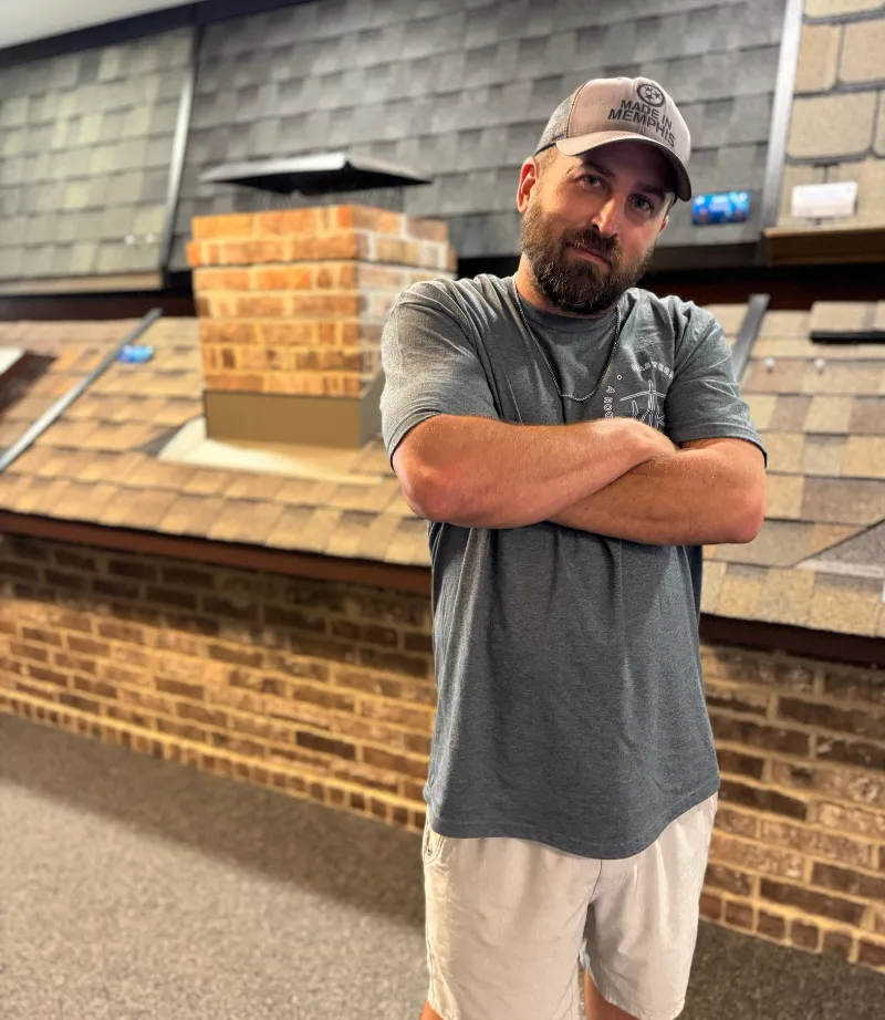 Chris Williams in the Masters Roofing showroom.