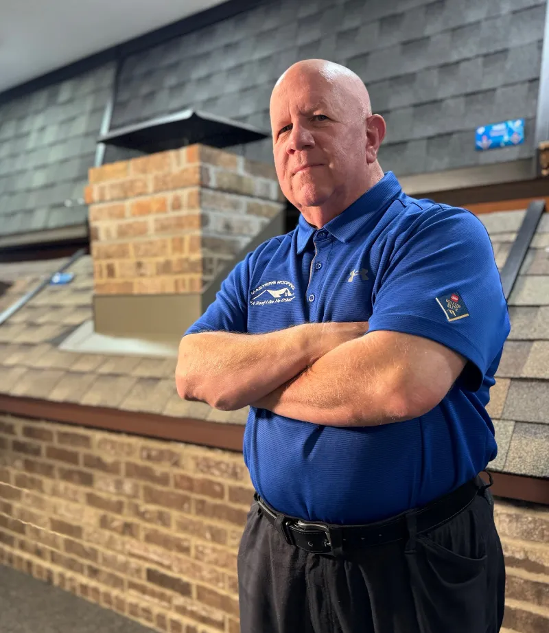 Ed Hill in the Masters Roofing showroom.