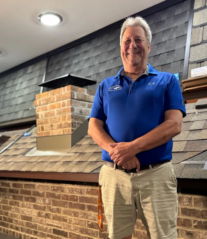 Bill Bowlin in the Masters Roofing showroom.