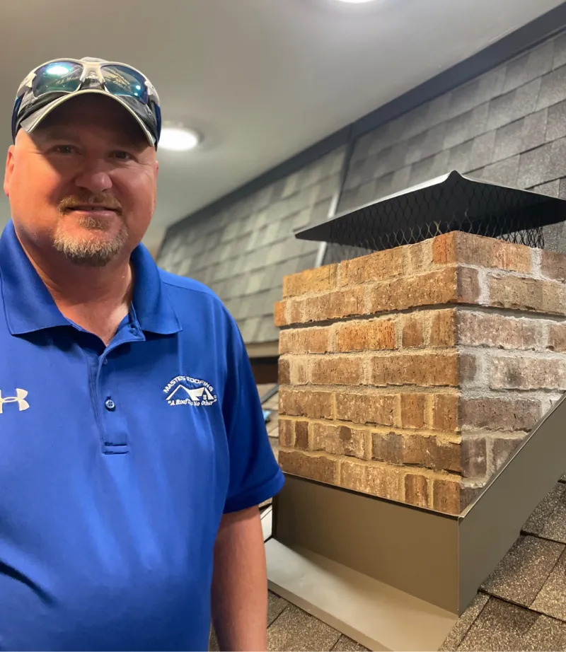 Pat Clevenger in the Masters Roofing showroom.