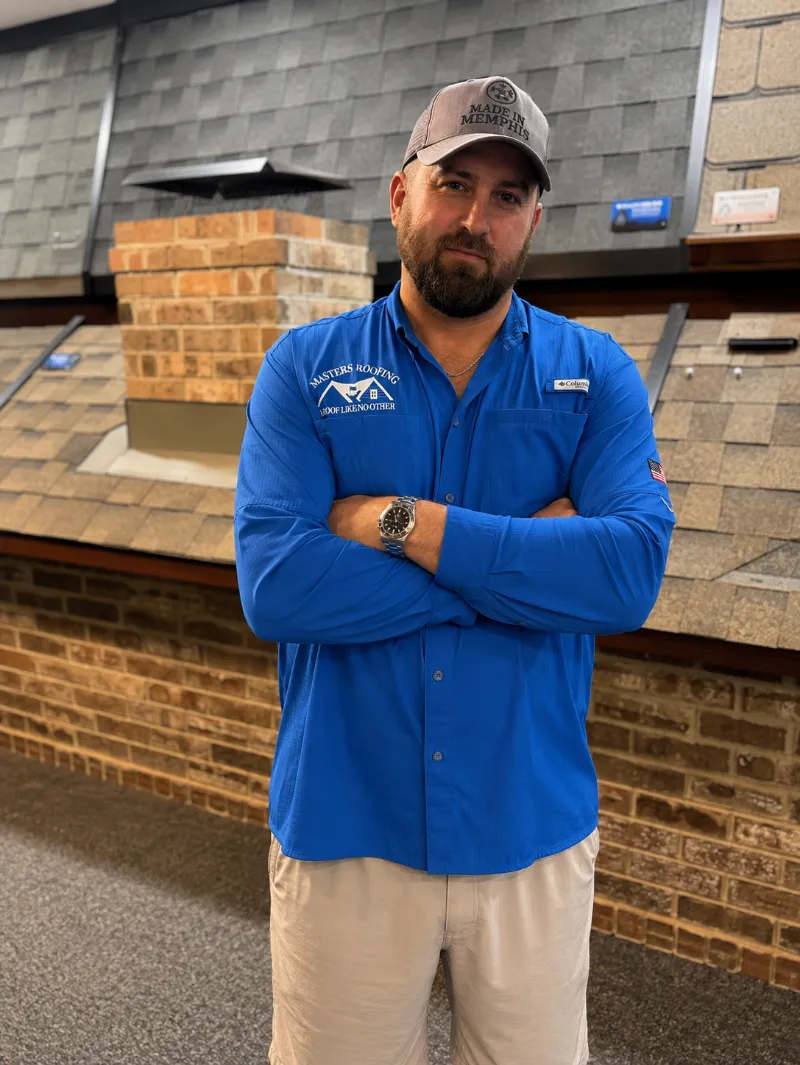 Chris Williams in the Masters Roofing showroom.