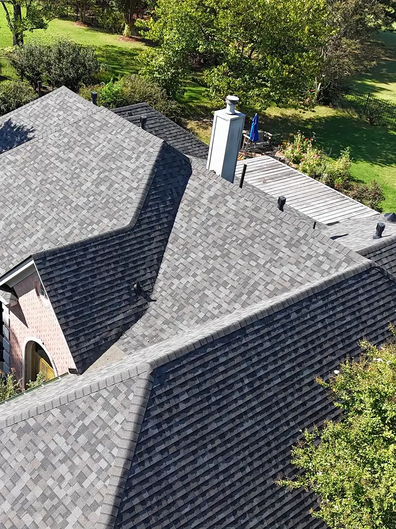 Olive Branch roof replacement with tuxedo gray accents.