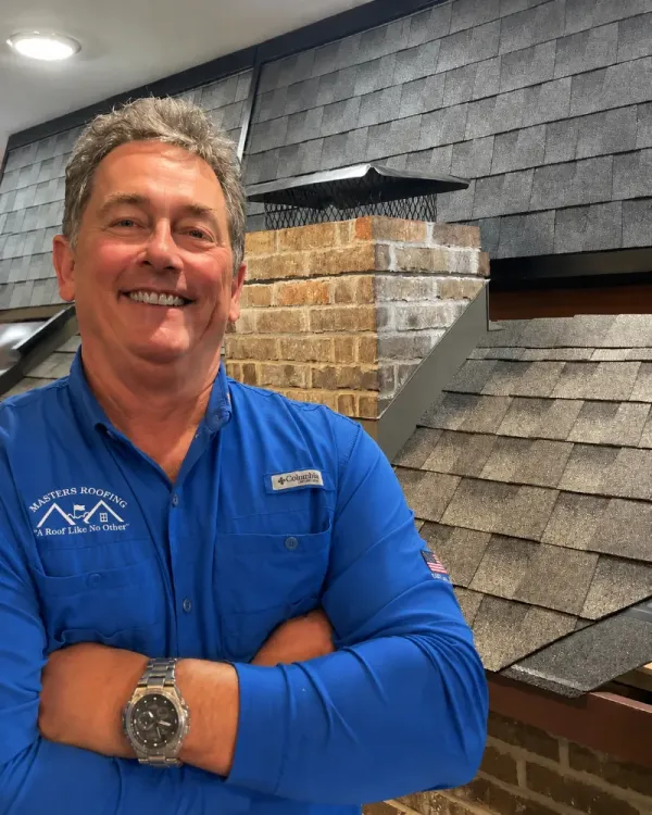 Dillon Scruggs in the Masters Roofing showroom.