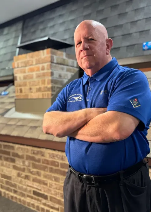 Ed Hill in the Masters Roofing showroom.