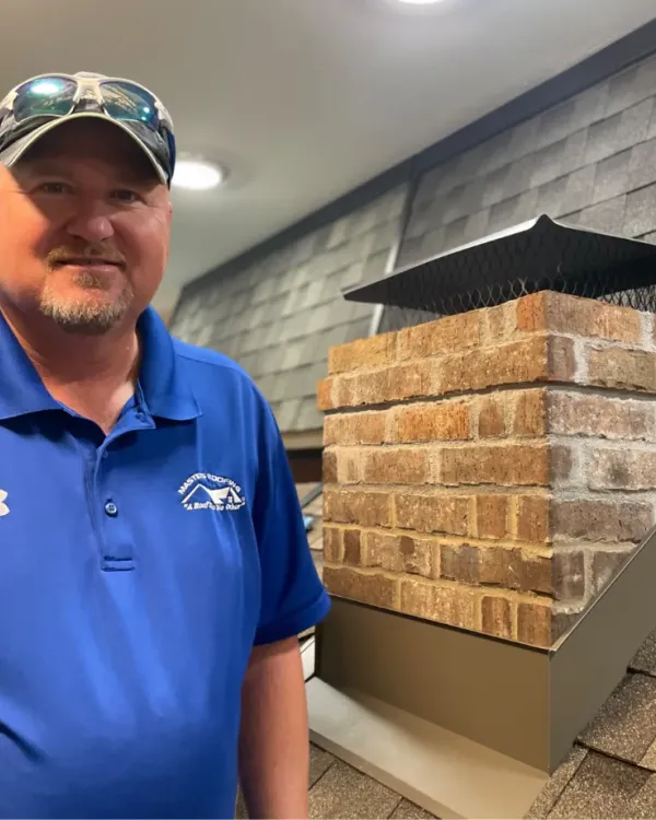 Pat Clevenger in the Masters Roofing showroom.