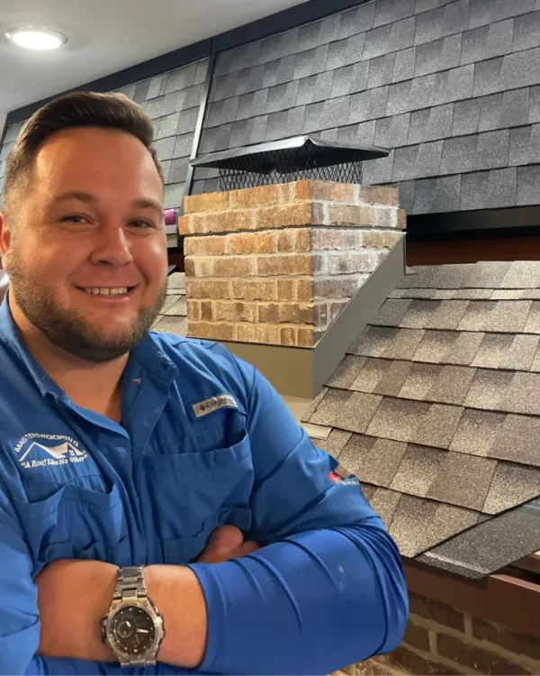 Andrew Itnyre in the Masters Roofing showroom.