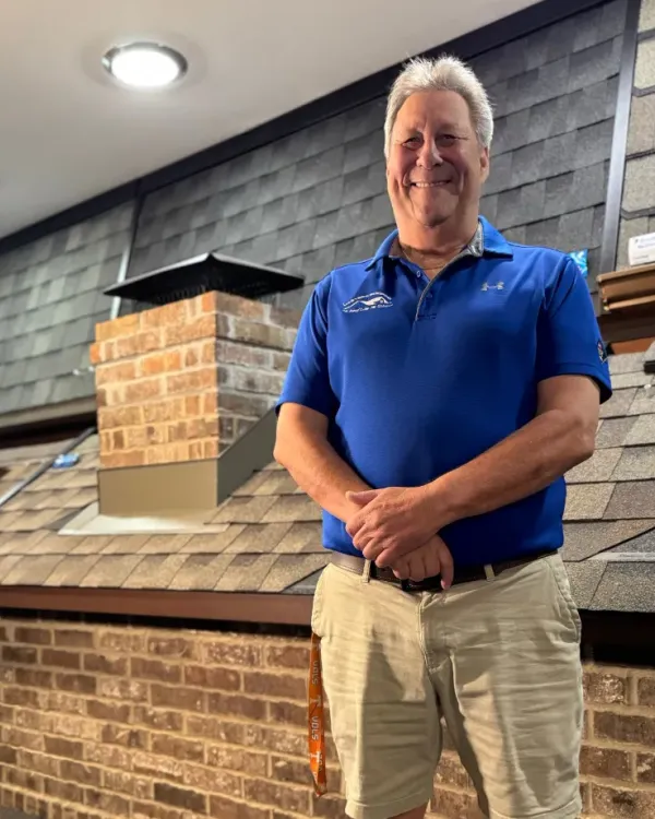 Bill Bowlin in the Masters Roofing showroom.