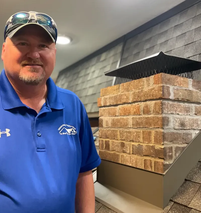 Pat Clevenger in the Masters Roofing showroom.